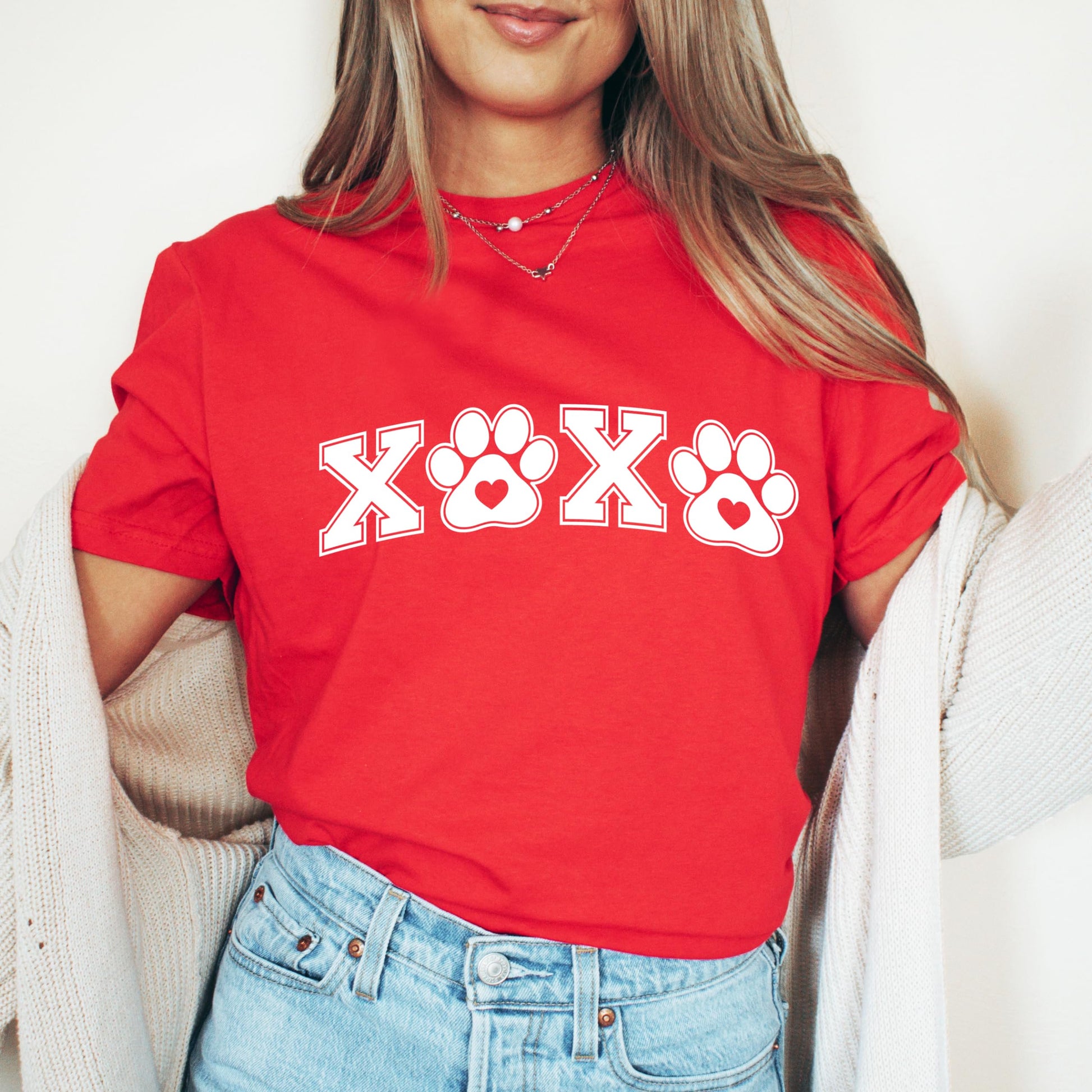 Pet lover Valentine's Day shirt with paw print and XOXO design, lifestyle view