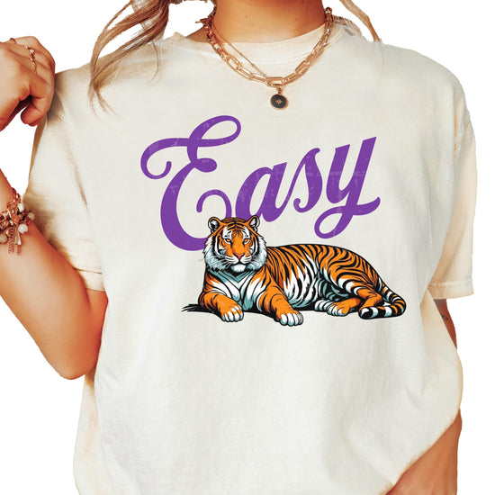 Easy Tiger women's ivory graphic tee with bold purple lettering and detailed tiger design, front view