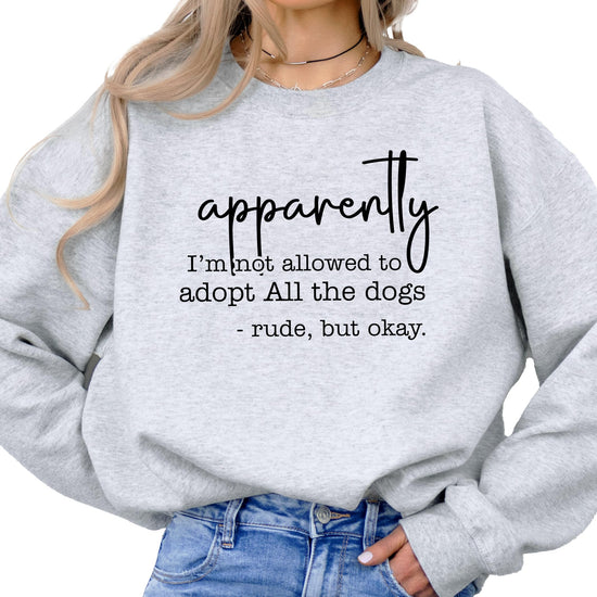 Flat lay of gray sweatshirt showing full funny dog mom adoption text design