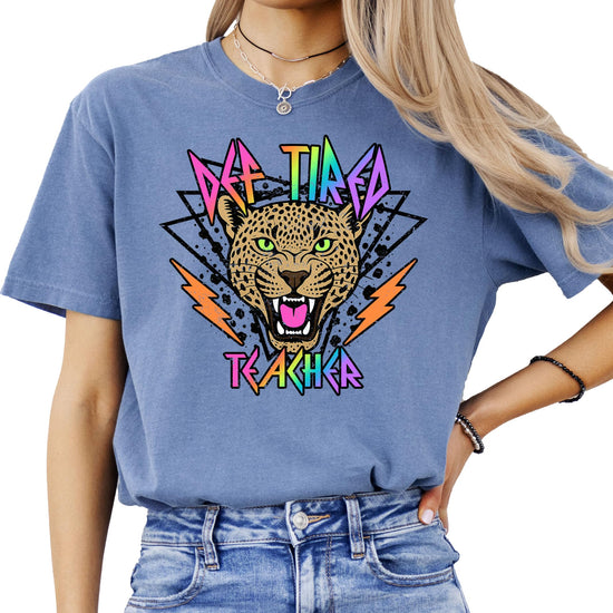 Close-up of bold tiger face and retro neon text on Def Tired Teacher graphic tee