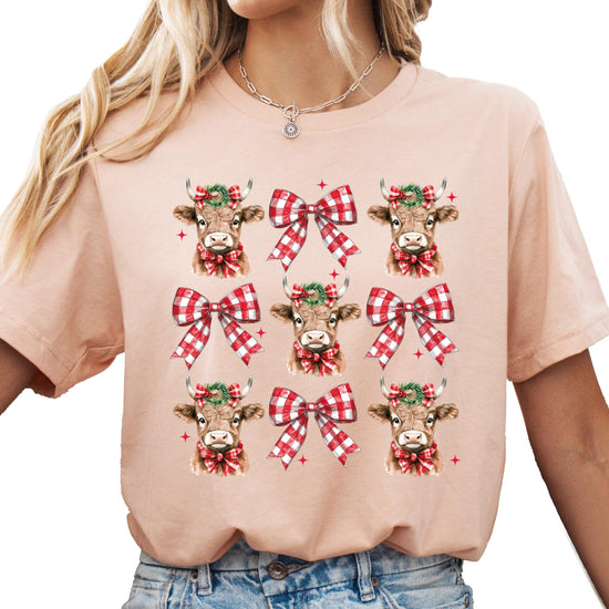 Side or detail view of Christmas cow plaid bow holiday shirt for women and teens