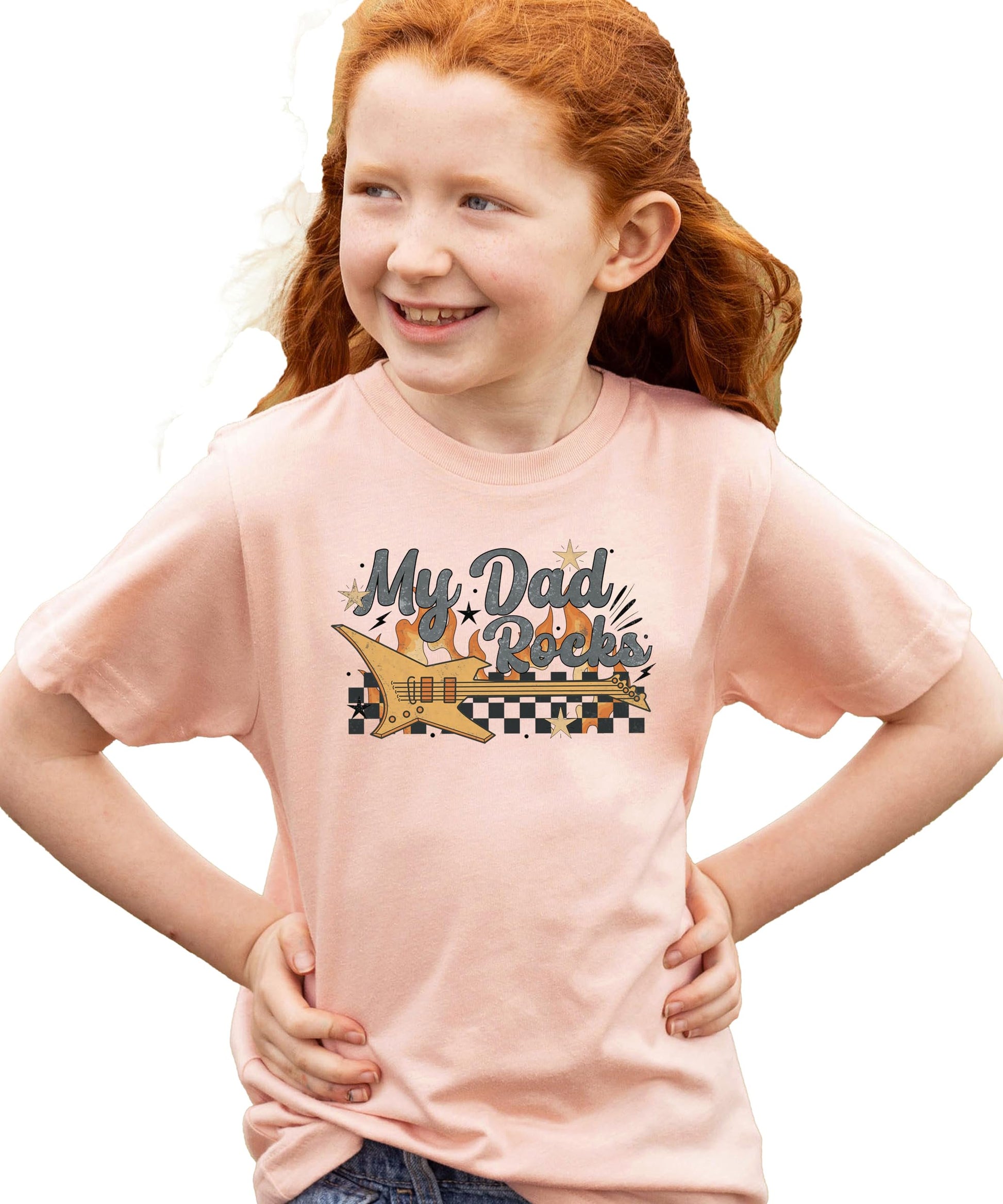 Close-up of My Dad Rocks electric guitar and flame graphic print on kids' peach t-shirt