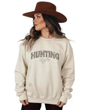 Front view of women's camo pullover sweatshirt with hunting wife graphic design