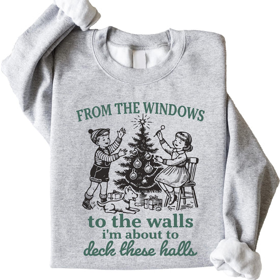 Detail shot of Deck These Halls humorous Christmas sweatshirt graphic on soft gray fleece