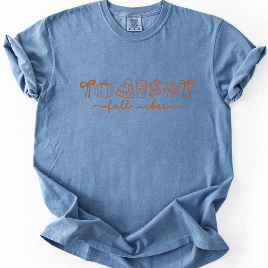 Fall Vibes t-shirt styled with jeans showing relaxed fit and autumn graphic design