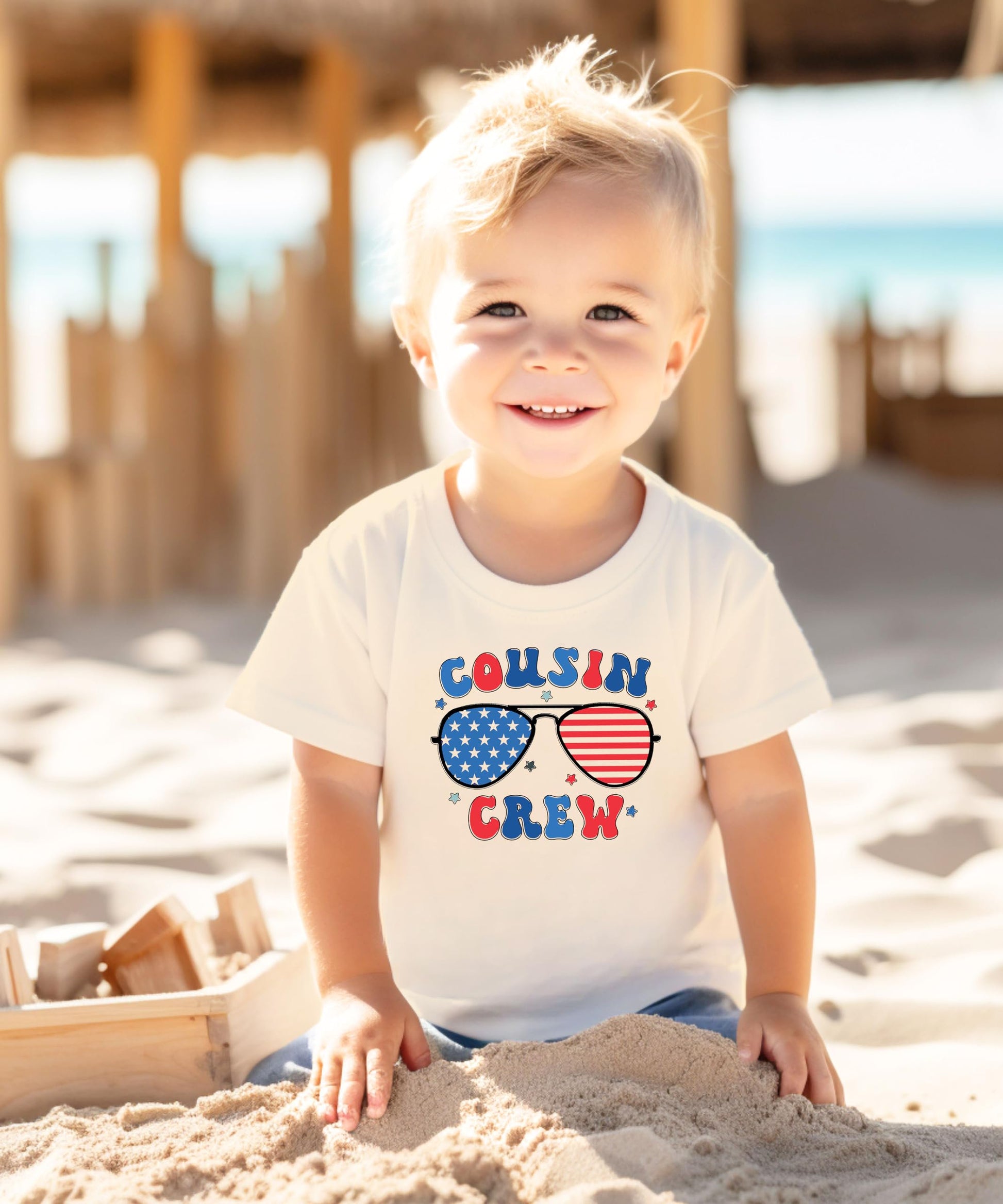 Youth wearing peach Cousin Crew patriotic t-shirt showing fit and style