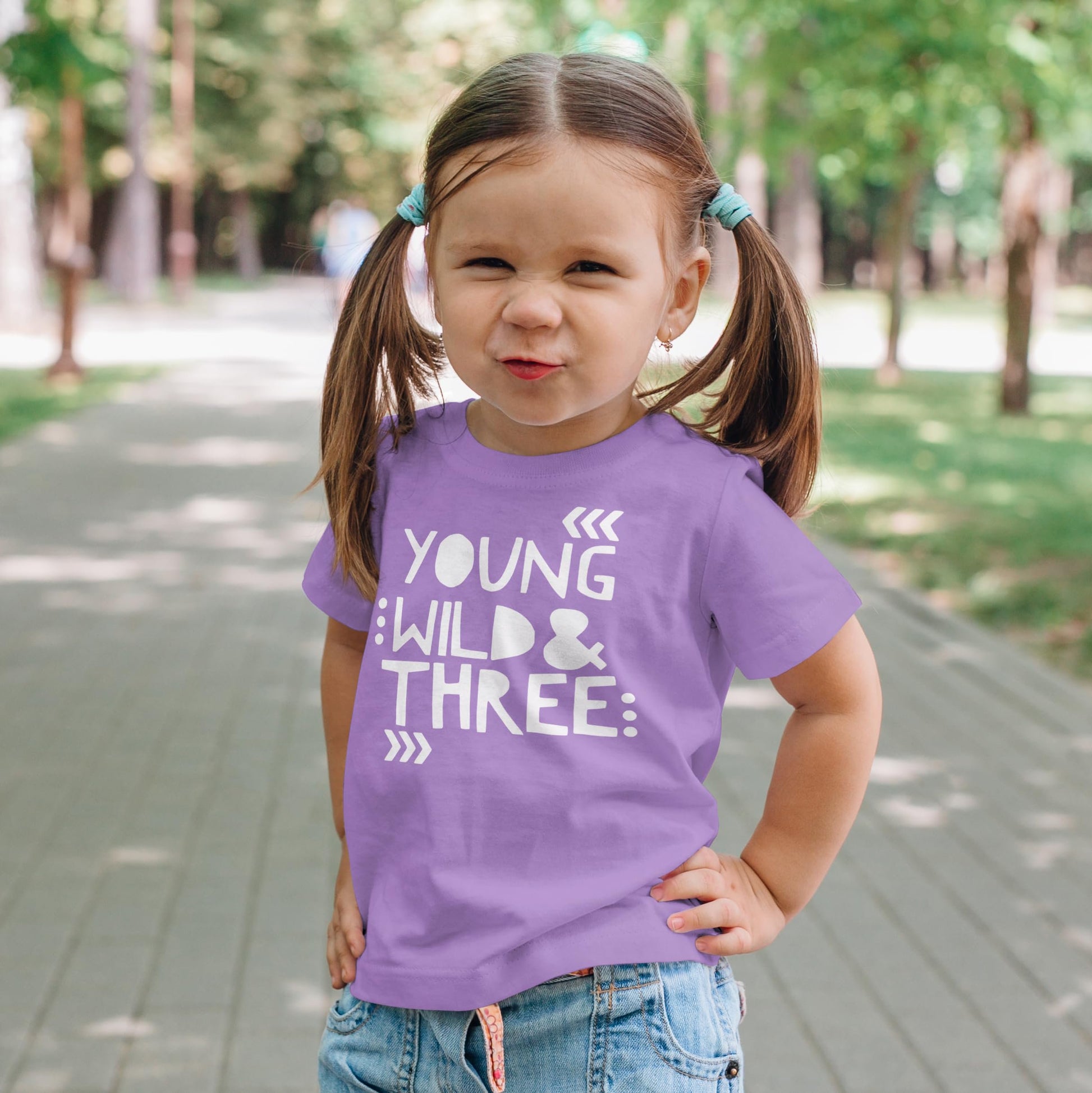 Size chart and product details for Young Wild and Three toddler birthday shirt