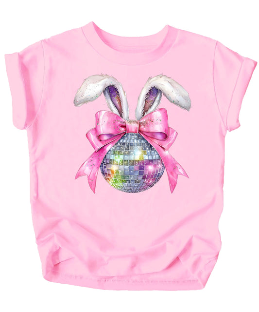 Close-up of disco bunny graphic on pink kids Easter shirt with glittery bow and disco ball detail