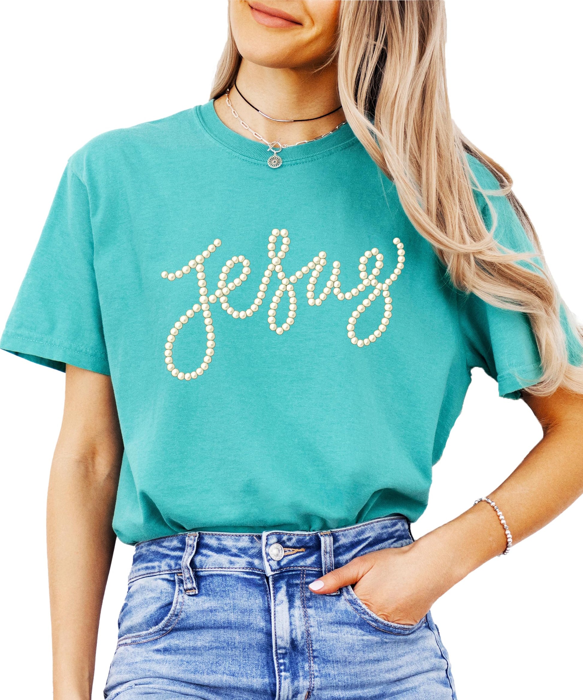 Side or lifestyle view of women wearing seafoam Jesus pearl script graphic tee