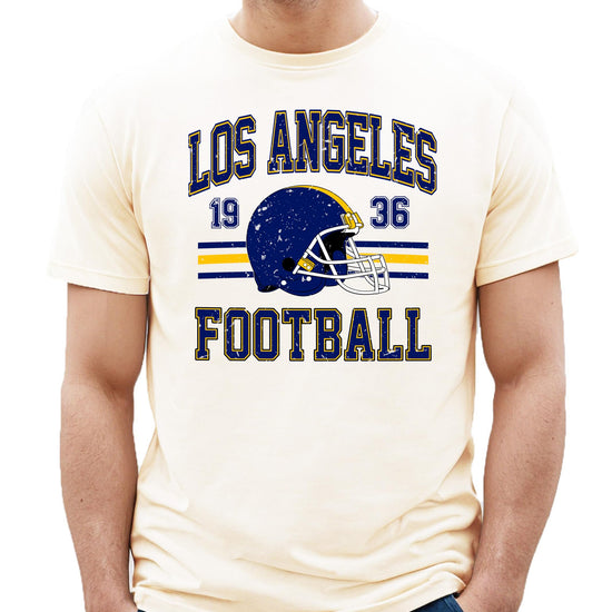 Vintage football tee laid flat showing full design of Los Angeles Football 1936 graphic in distressed blue and gold