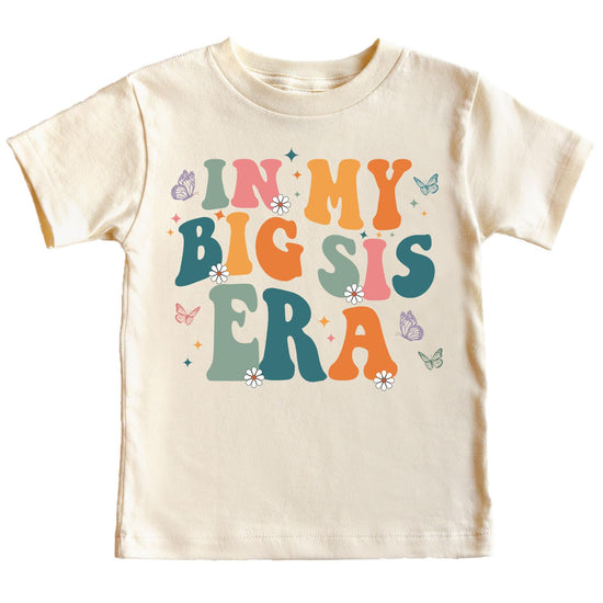 Front view of In My Big Sis Era kids shirt in peach with butterfly design and trendy lettering