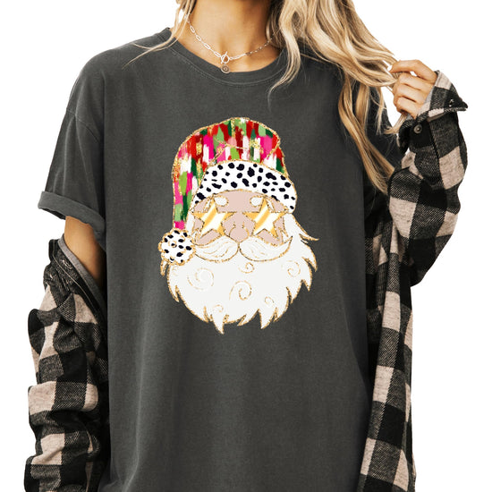 Front view of funny Santa gold sunglasses graphic on ivory women's Christmas holiday tee