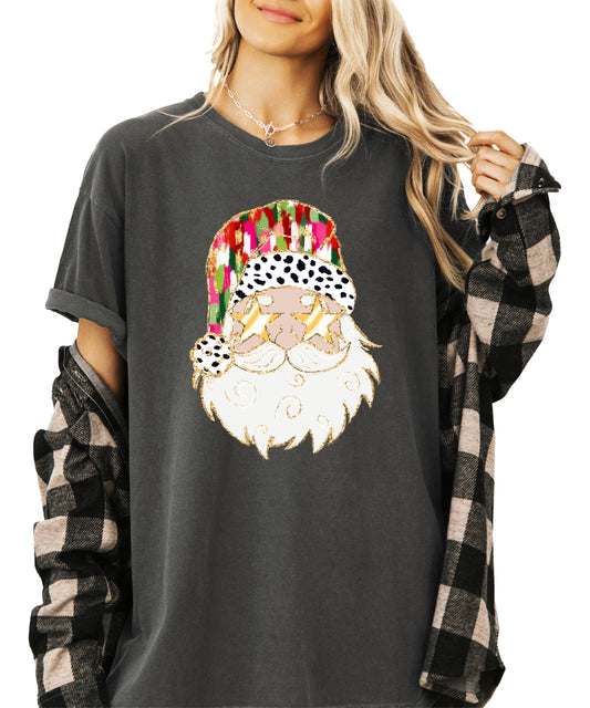 Front view of funny Santa gold sunglasses graphic on ivory women's Christmas holiday tee