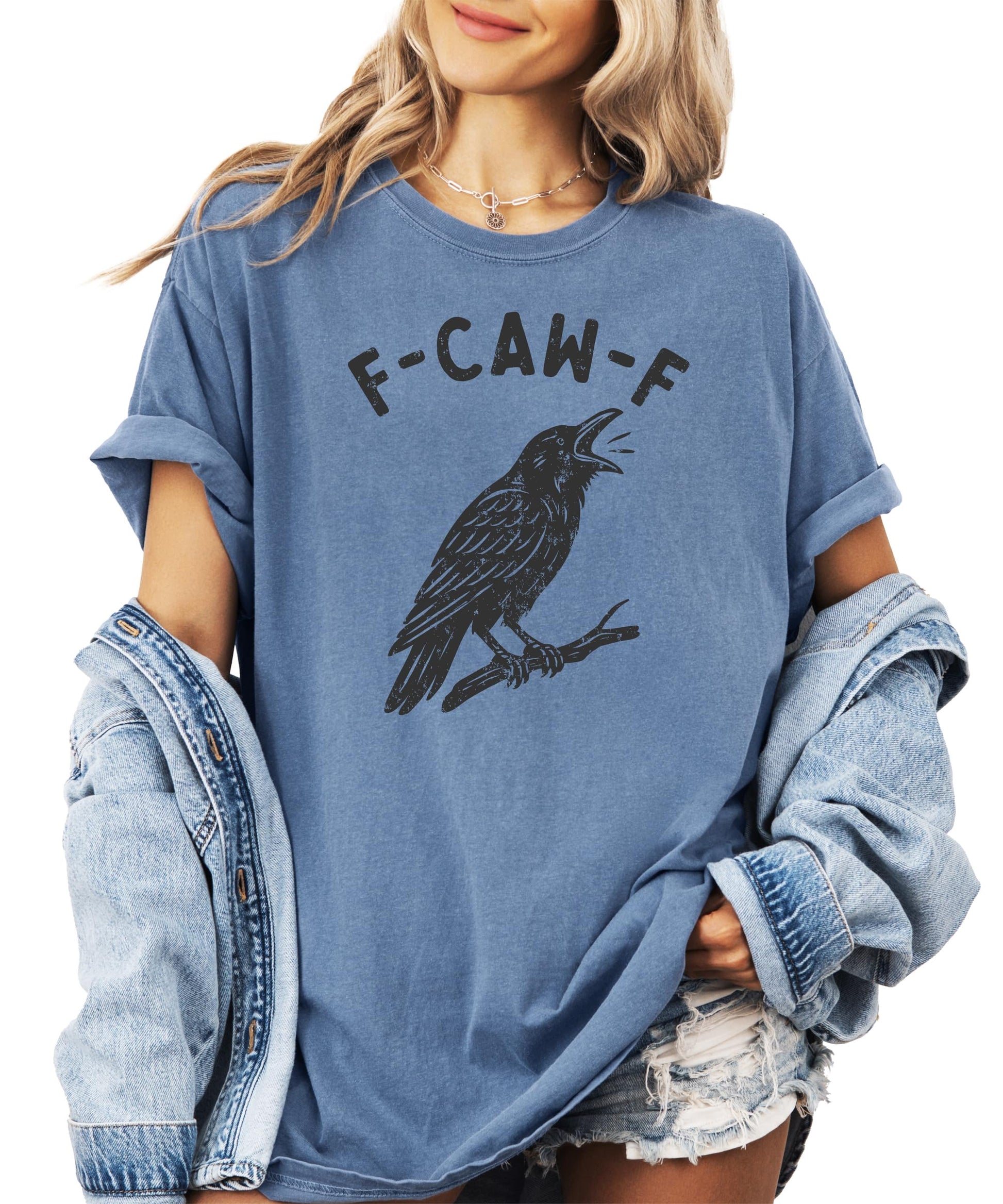 Seafoam green adult graphic tee featuring a bold black crow and the funny phrase F-Caw-F for Halloween