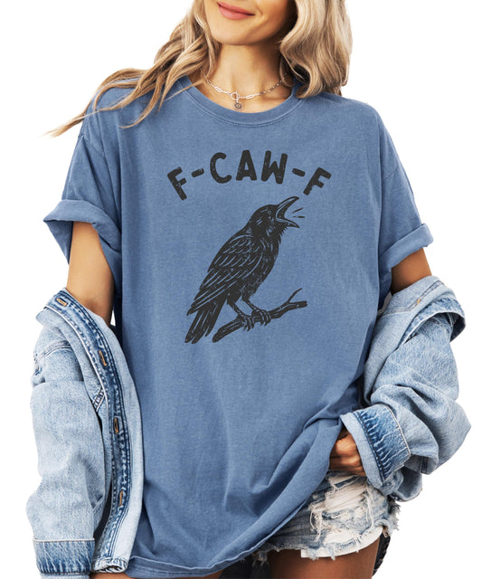 Seafoam green adult graphic tee featuring a bold black crow and the funny phrase F-Caw-F for Halloween
