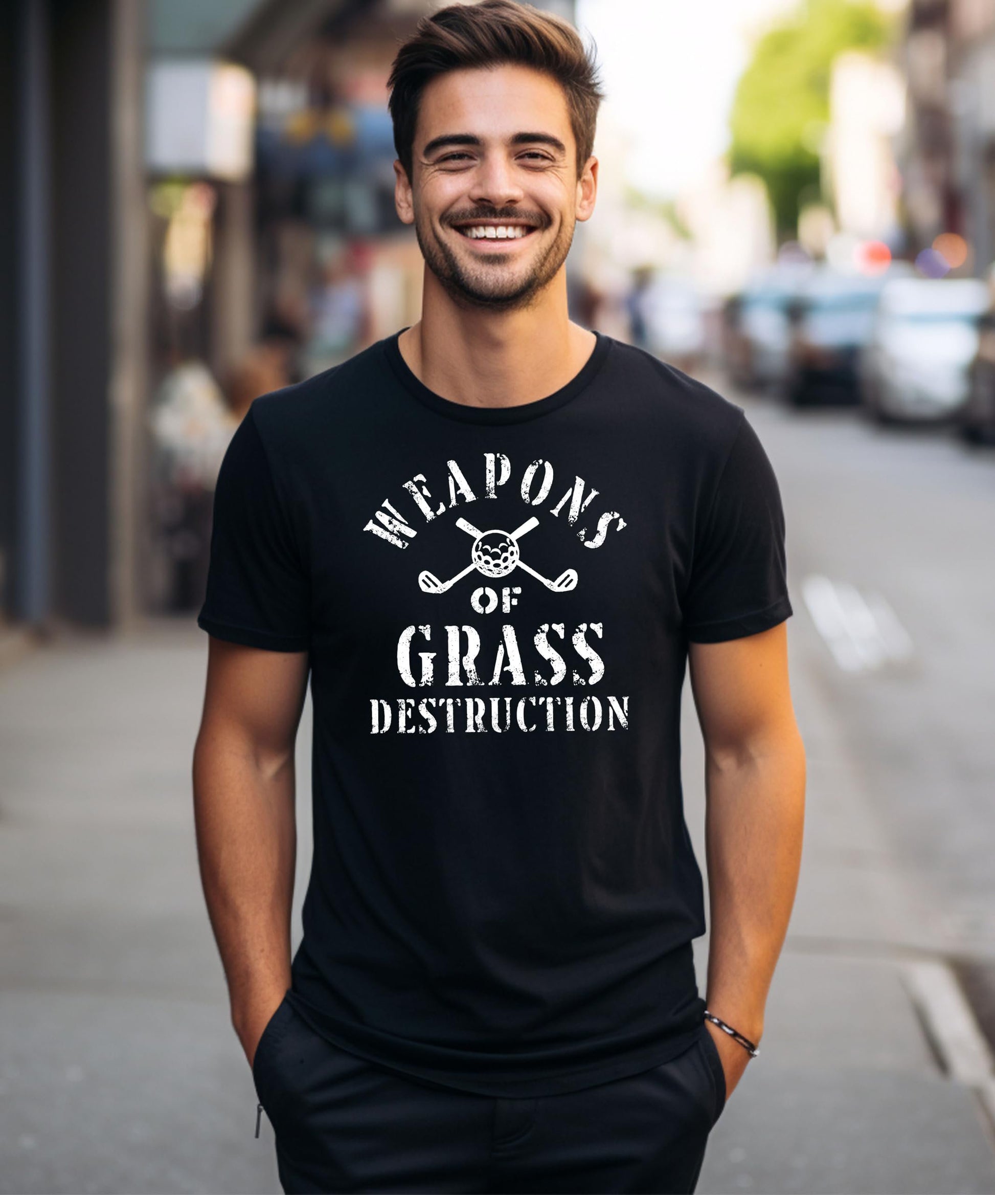 Flat lay of black golf graphic tee showing full design details