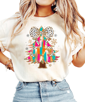 Women's seafoam shirt with faux glitter painted Christmas tree and dalmatian dot coquette bow graphic