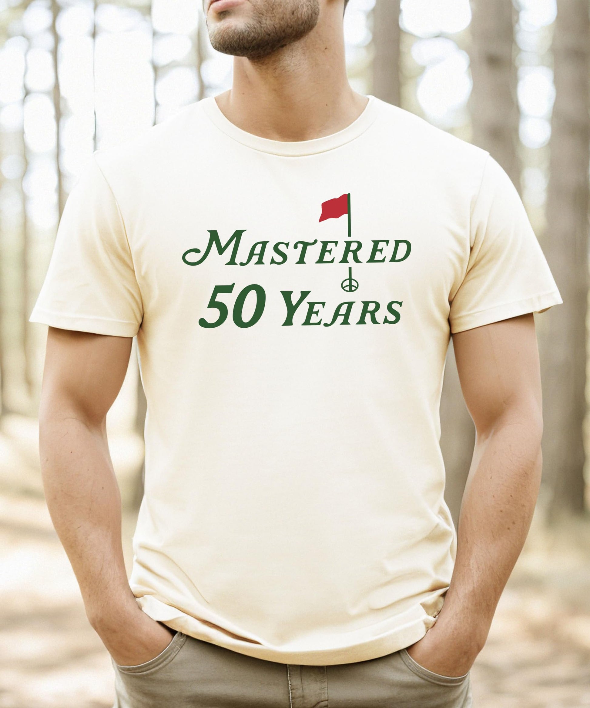 Back view of Mastered 50 Years funny golf tee in vintage green