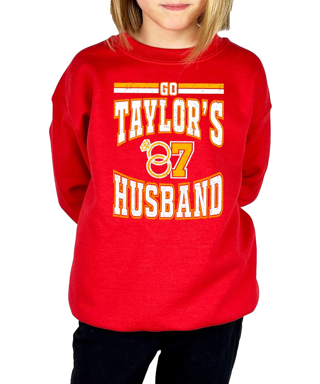 Woman wearing red Go Taylor's Husband crewneck sweatshirt styled with jeans for a casual game day look