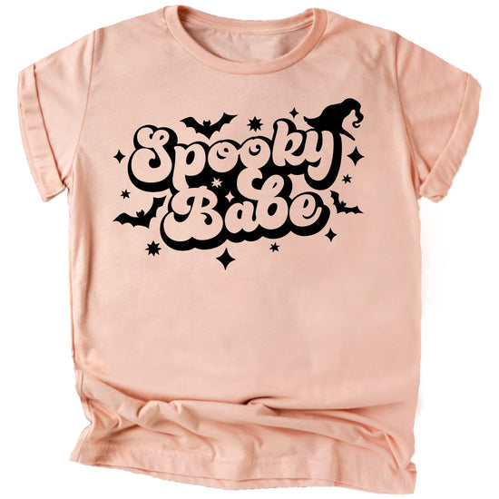 Close-up of orange spiderweb Spooky Babe print on vintage burgundy toddler shirt