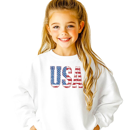 Close-up of distressed American flag print on black pullover sweatshirt