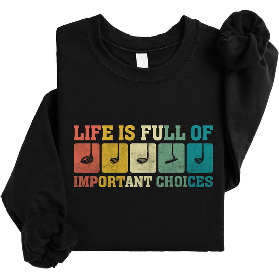 Men's black graphic sweatshirt with humorous golf theme, shown laid flat to display full Important Choices design
