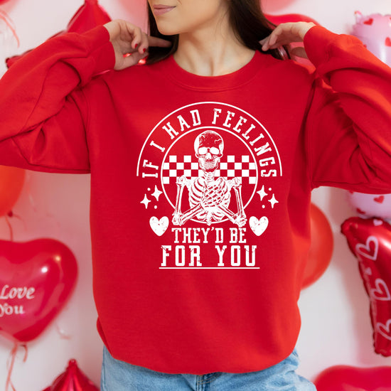 Front view of red Valentine's Day skeleton sweatshirt with humorous graphic print by Olive Loves Apple