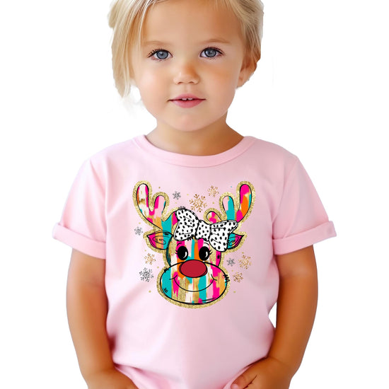 Flat lay of girls' pink Christmas reindeer shirt showing full graphic and crew neck style