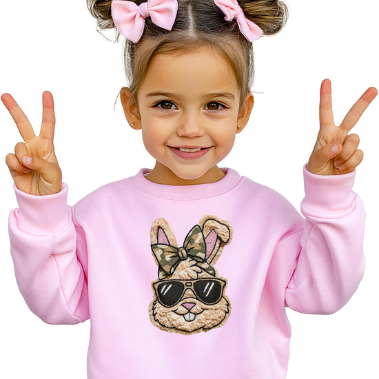 Black pullover sweatshirt featuring trendy bunny with sunglasses and camo bow