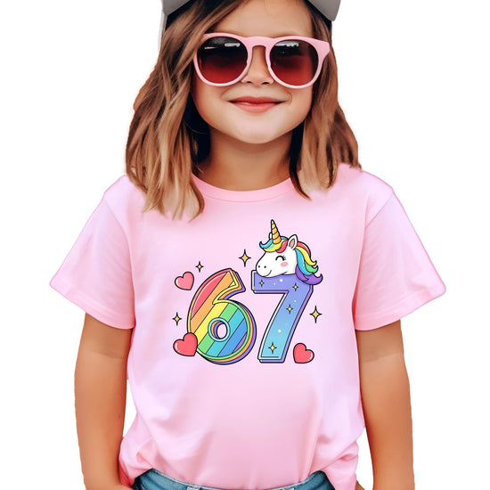 Close-up of rainbow striped number 6 and purple starry number 7 with unicorn birthday shirt design