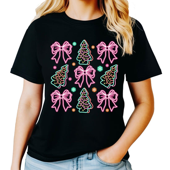 Detail shot of neon Christmas trees and colorful gift bows graphic on women's black holiday shirt