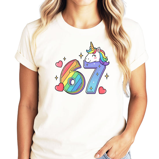 Pink unicorn 7th birthday tee with colorful rainbow design and magical unicorn character