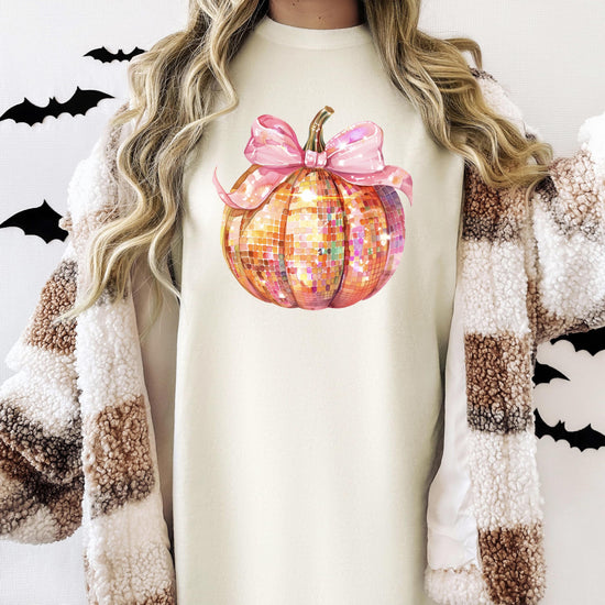 Back or side view of seafoam green disco pumpkin Halloween graphic tee for women and teens