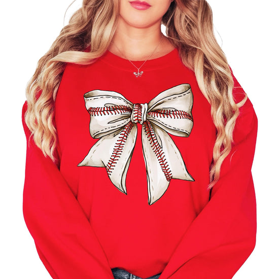 Close-up of coquette bow graphic print on red women's baseball fan sweatshirt