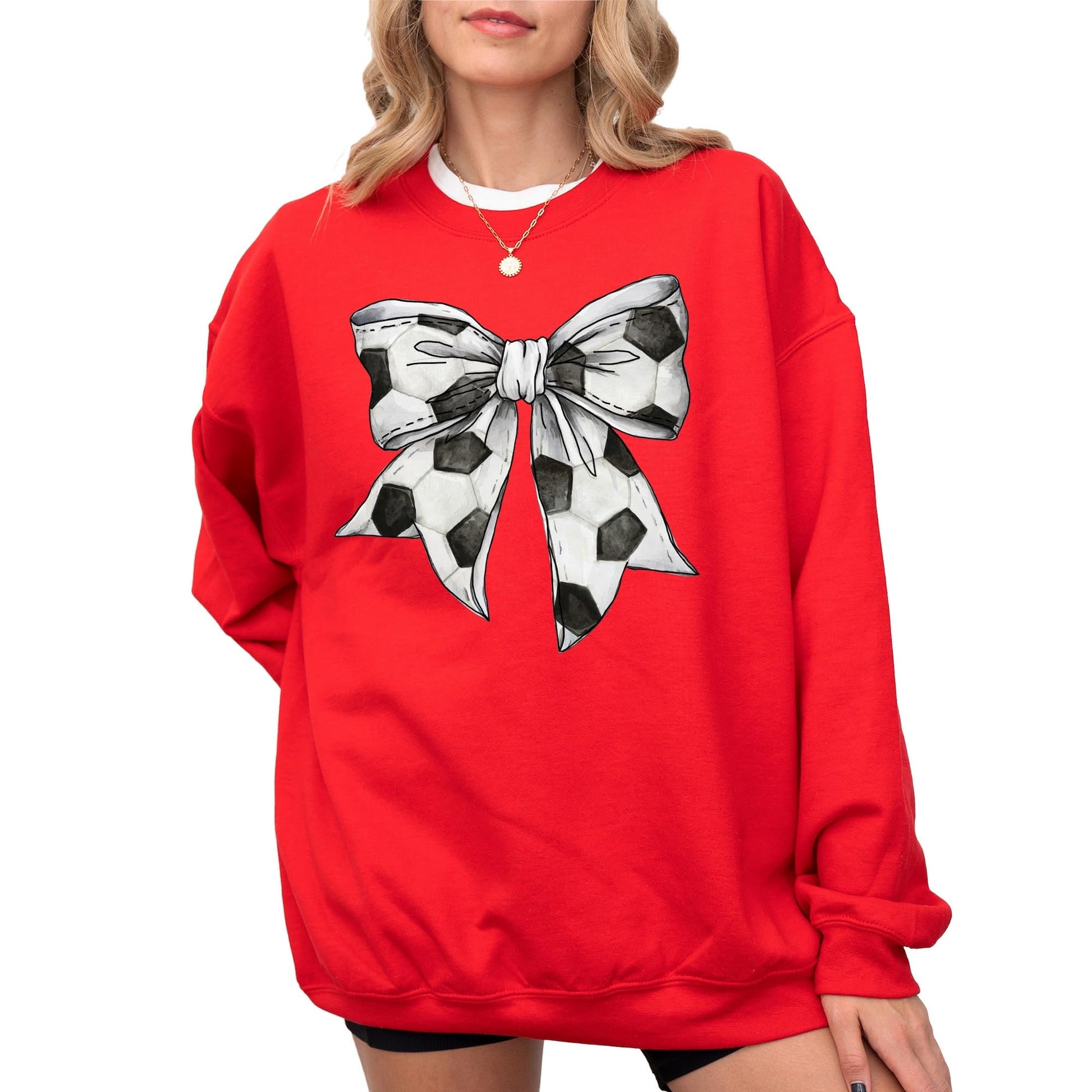 Close-up of soccer coquette bow graphic print on gray pullover sweatshirt