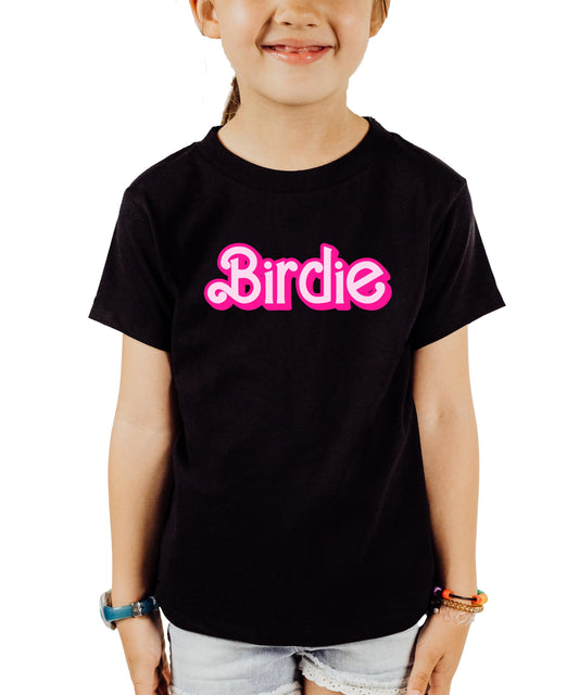 Close-up of retro pink birdie golf graphic printed on a black women's t-shirt
