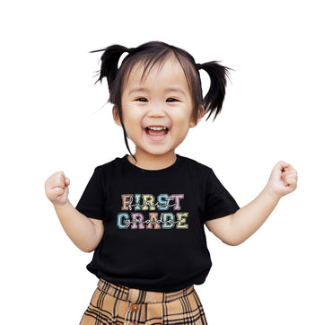 Girls first grade t-shirt with colorful bold pastel letter font, perfect for back to school
