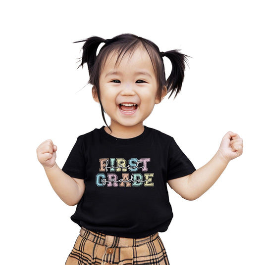 Girls first grade t-shirt with colorful bold pastel letter font, perfect for back to school