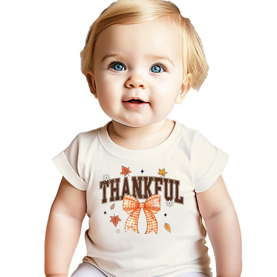 Orange Thankful shirt with gingham bow and autumn leaf design for toddlers and girls
