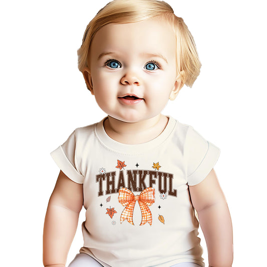 Orange Thankful shirt with gingham bow and autumn leaf design for toddlers and girls