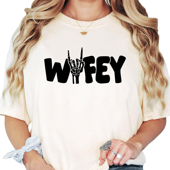 Flat lay of Wifey skeleton Halloween shirt showing design details