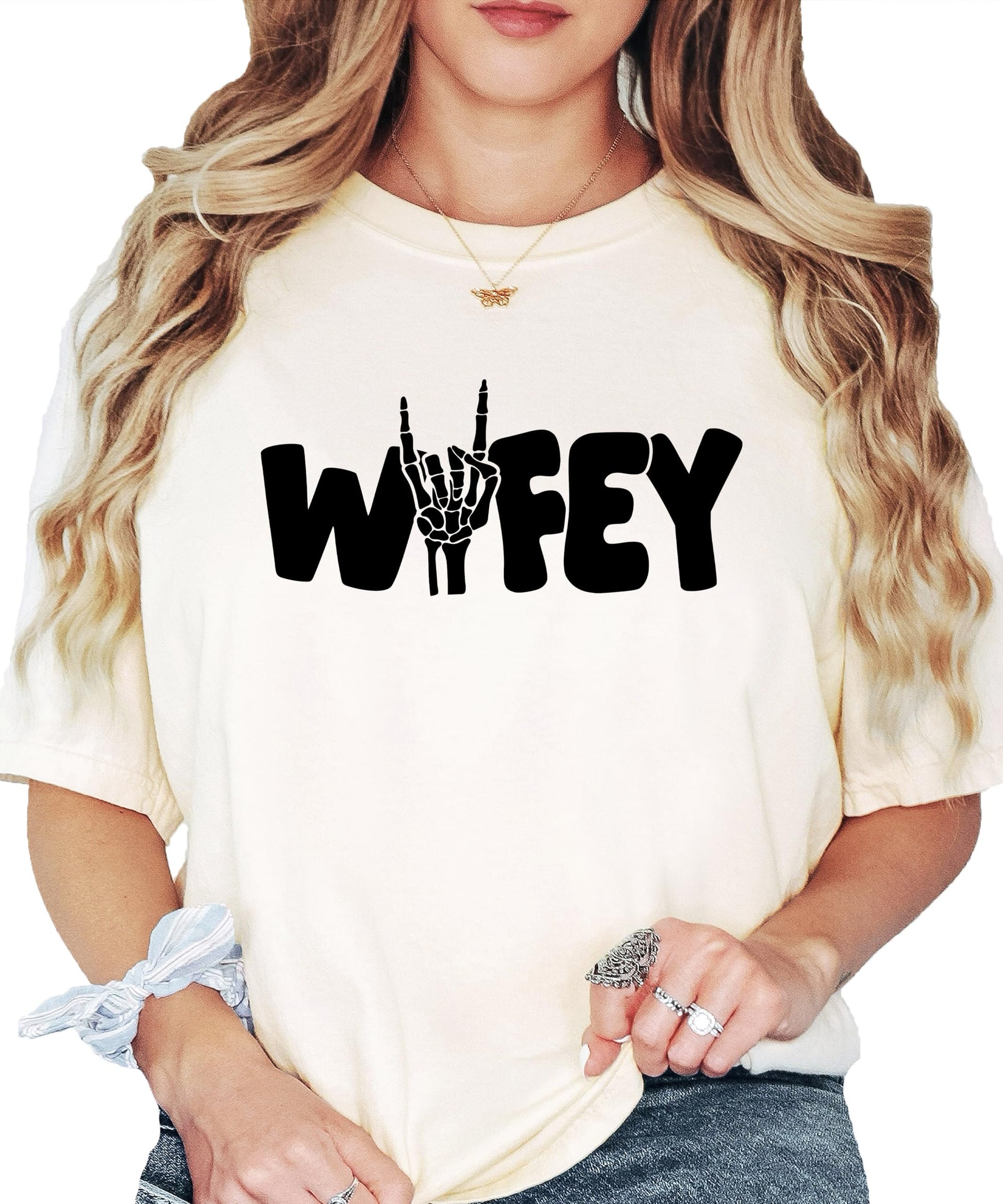 Flat lay of Wifey skeleton Halloween shirt showing design details