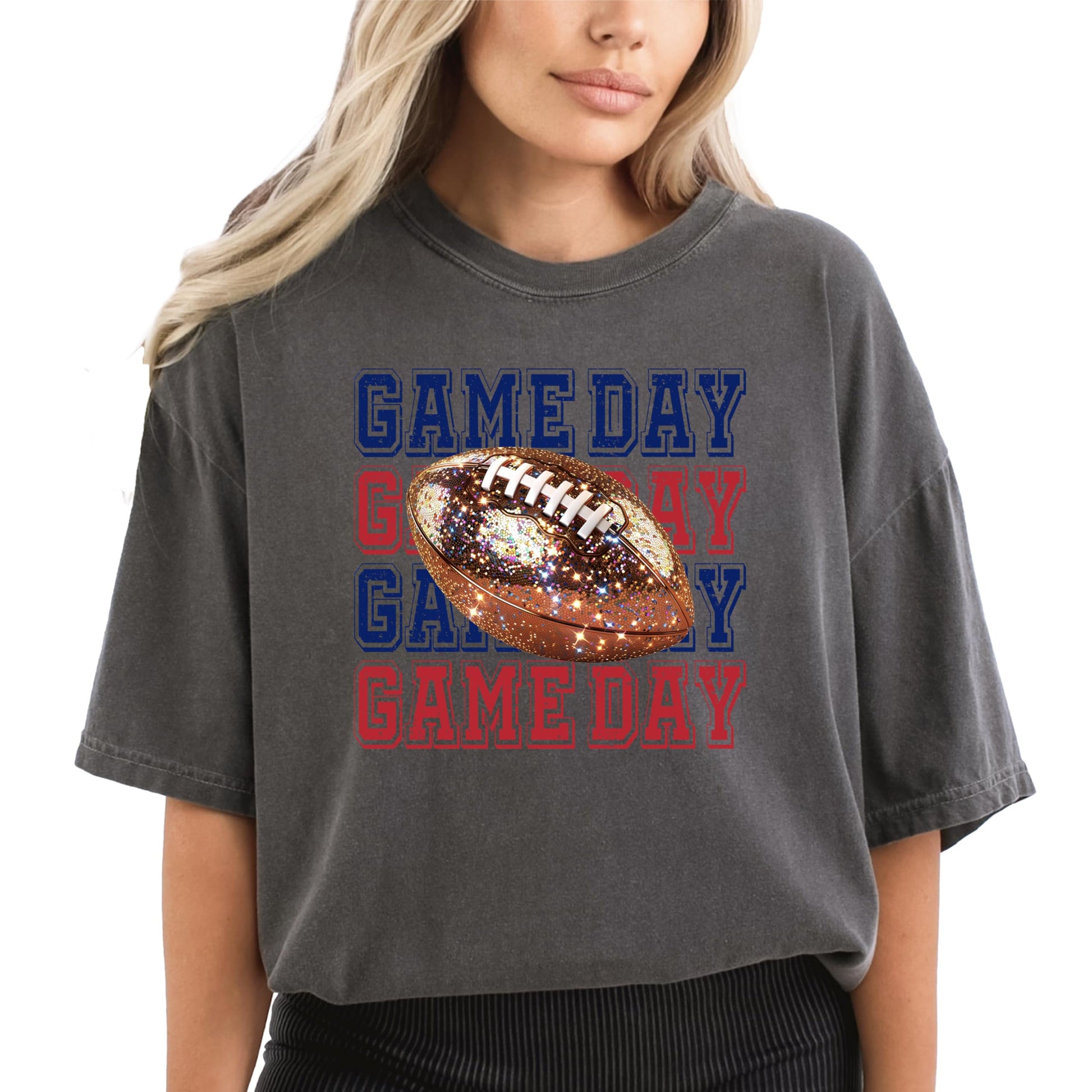 Close-up of faux glitter Game Day graphic in red and blue on women's football pullover shirt