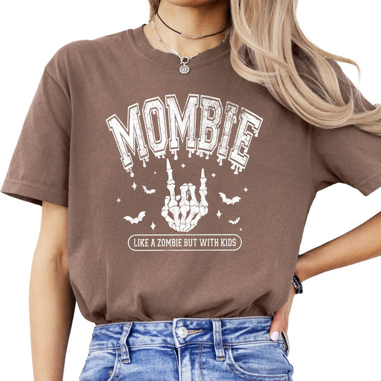 Women's Mombie Halloween graphic tee with skeleton rock-sign hand and 'Like a Zombie But With Kids' text