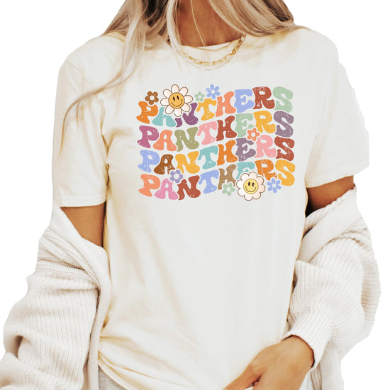 Panthers team pride shirt displayed flat showing full retro design with bold text and cheerful flowers