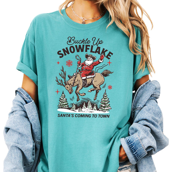 Back or side view of ivory unisex western Santa graphic tee for men and women