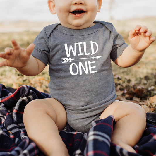 Olive Loves Apple Wild One 1st birthday bodysuit for baby boys in royal blue