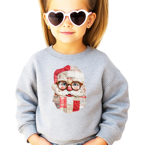 Black sweatshirt with ink-printed faux patchwork Santa face wearing vintage glasses, women's Christmas holiday top