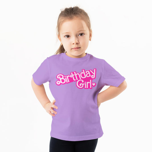 Girl wearing purple doll birthday shirt for birthday party outfit