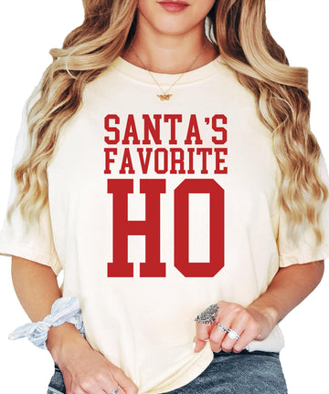 Women's Christmas humor tee with Santa's Favorite Ho text graphic